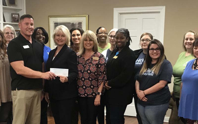 Beaumont Foundation presents check to Buckner