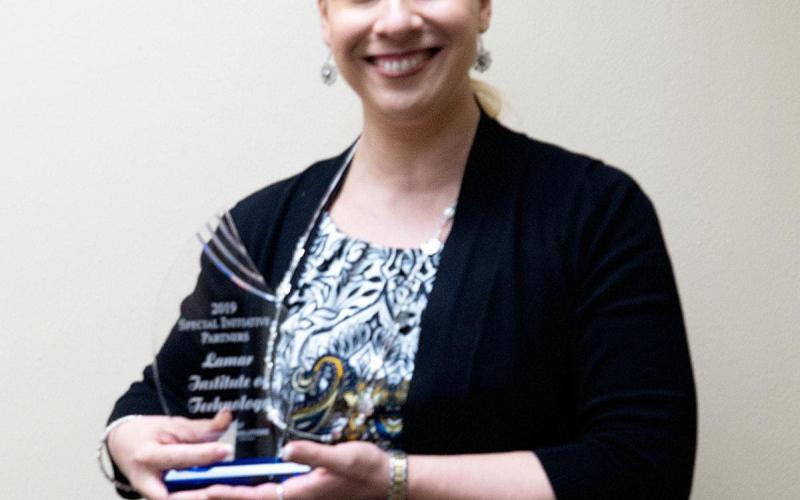 LIT’s Dean of Strategic and Workforce Initiatives Dr. Miranda Phillips holds the 2019 Special Initiative Partners Award from Workforce Solutions of Southeast Texas. Phillips wrote the grant to launch the inaugural Women’s Entrepreneurship Boot Camp.