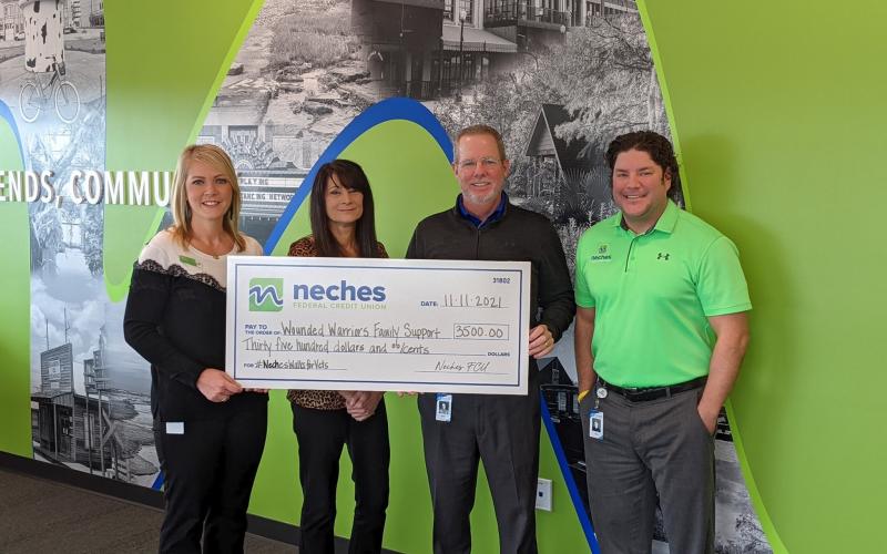 Neches FCU raises $3,500 for Wounded Warrior Family Foundation.