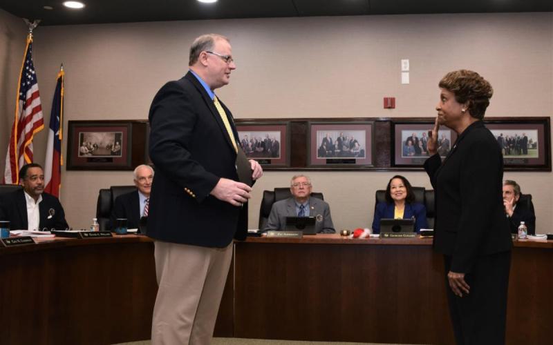Port Director Chris Fisher administers the oath of office to incoming Port of Beaumont Board Commissioner for Ward 3 LaRue Smith. (Port of Beaumont photo)