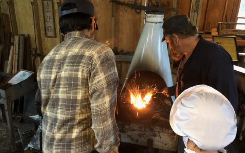 Sea Scouts learn blacksmithing.