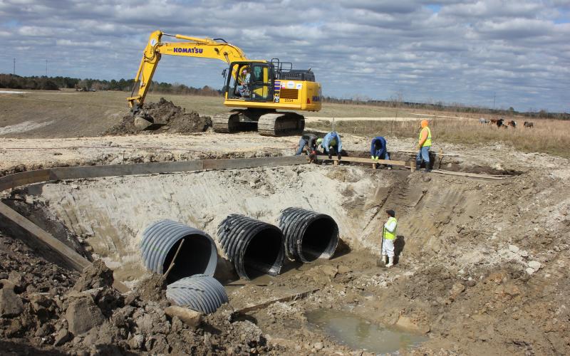 DD6 workers widen this crossing on Ditch 1205, aka Byrd Gully.
