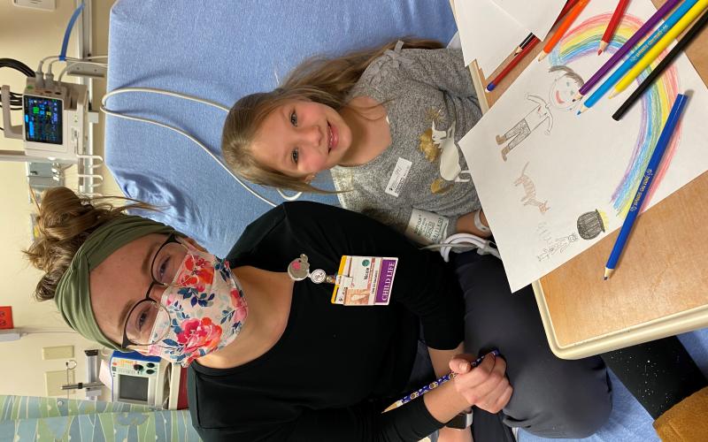 Nicole Albert with a patient