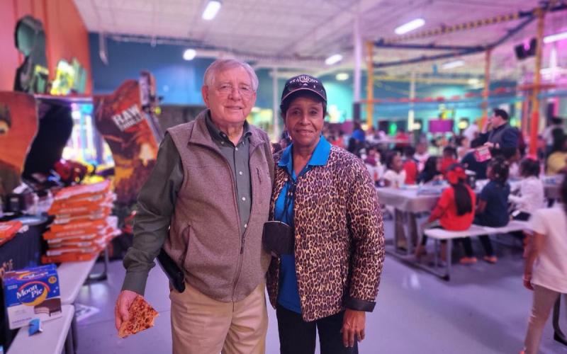 Port Commissioners Pat Anderson and LaRue Smith celebrate students' success at Urban Air.