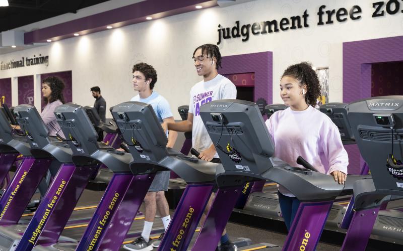 Teens work out for free with the Planet Fitness High School Summer Pass.