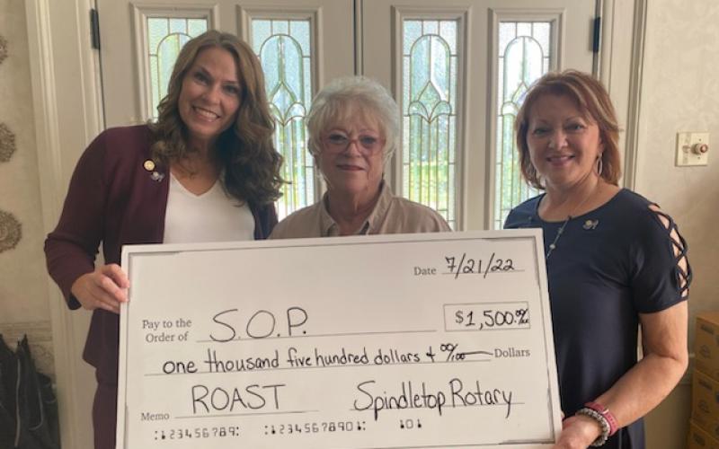 2021-22 Spindletop Rotary President Shannon Garrod, Some Other Place Executive Director Paula O’Neal and 2022-23 Spindletop Rotary President Micah Leigh