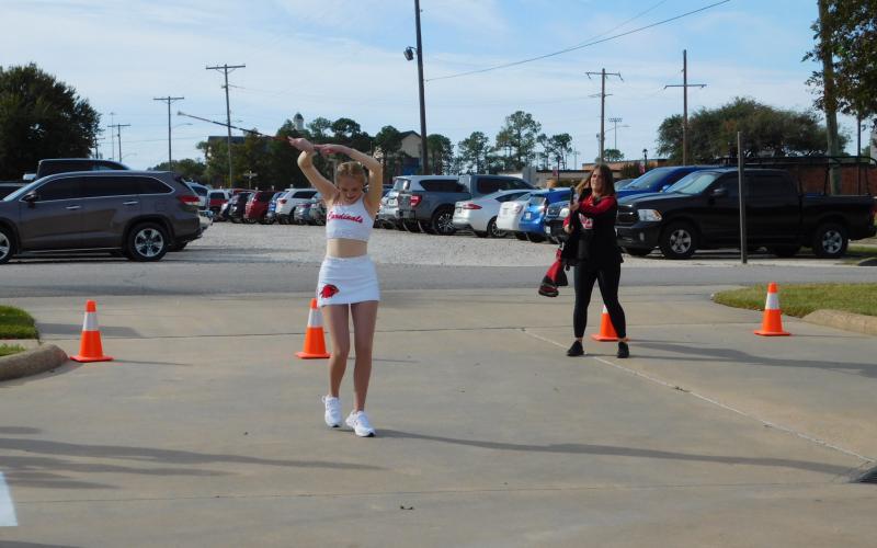 LU twirler Kristin Hebert performs at ribbon cutting (Photo by Sharon Brooks)