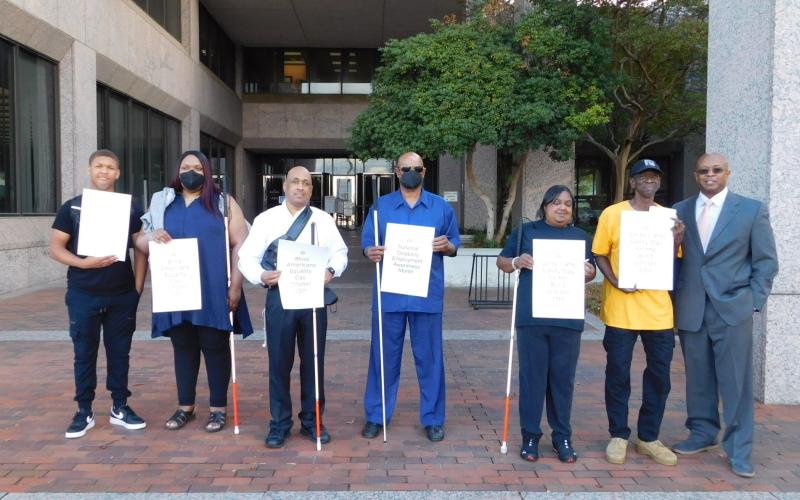 Members of the BACB raise awareness in honor of White Cane Day.