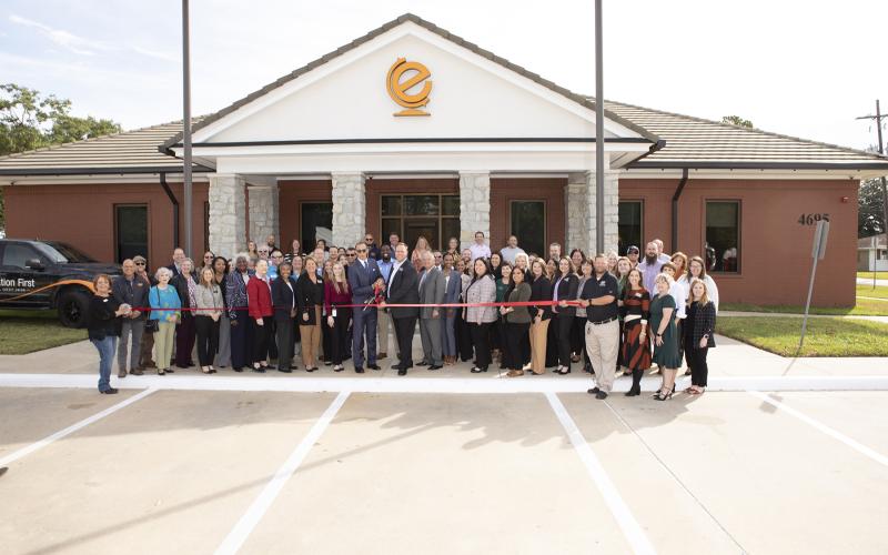 Cutting the ribbon at Education First remodel unveiling (Photo by Brandon Gouthier Photography)
