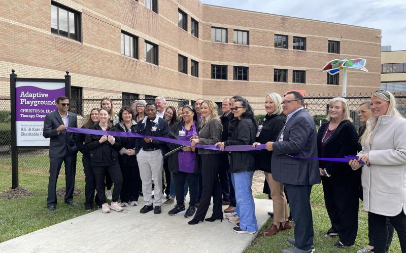 CHRISTUS and foundation leaders cut the ribbon on a new adaptive therapy playground in Beaumont