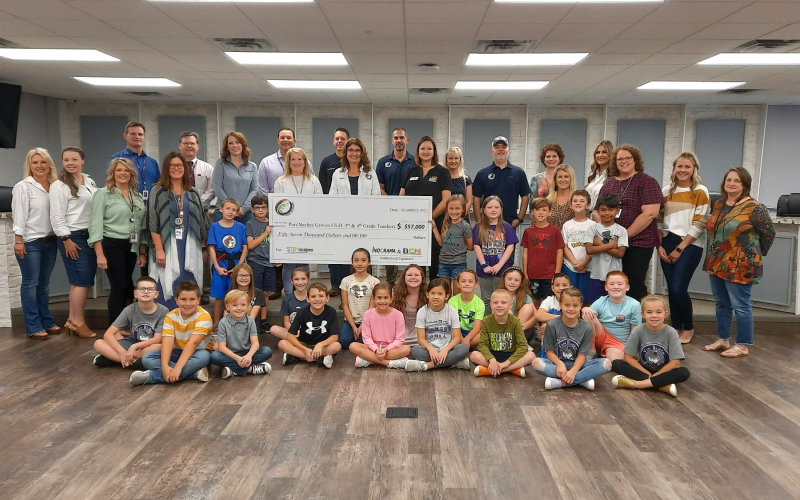 Indorama and BCM present Port Neches-Groves ISD with a check for $57,000 for STEAM education.