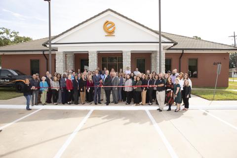 Cutting the ribbon at Education First remodel unveiling (Photo by Brandon Gouthier Photography)