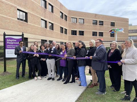 CHRISTUS and foundation leaders cut the ribbon on a new adaptive therapy playground in Beaumont