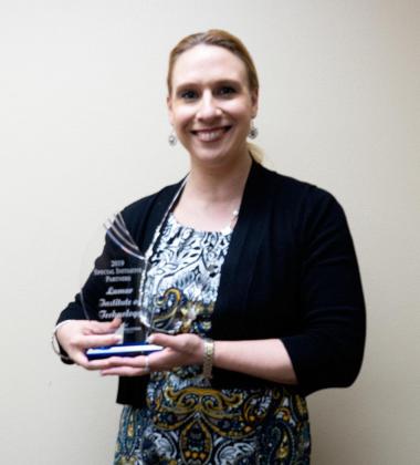 LIT’s Dean of Strategic and Workforce Initiatives Dr. Miranda Phillips holds the 2019 Special Initiative Partners Award from Workforce Solutions of Southeast Texas. Phillips wrote the grant to launch the inaugural Women’s Entrepreneurship Boot Camp.