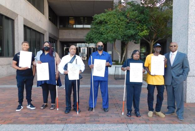 Members of the BACB raise awareness in honor of White Cane Day.