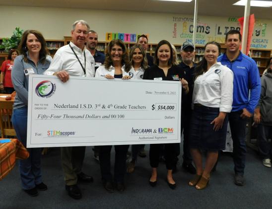 Indorama Ventures and Beaumont Children's Museum present Nederland ISD Superintendent Dr. Stuart Kieschnick with a $54k check for STEAM education.