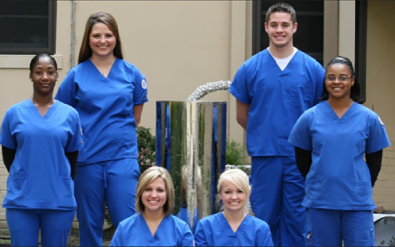 Barrow with LIT classmates in 2013 (courtesy photos)