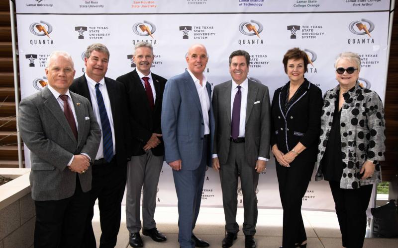 Quanta Services President and CEO Duke Austin alongside TSUS Chancellor Brian McCall, and the presidents of five of the seven TSUS member institutions.