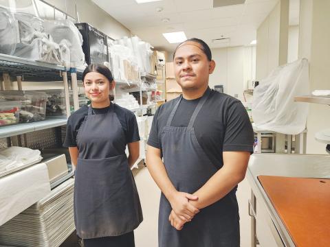Memorial High School senior culinary arts students Temini Menor and Edwin Ayundis  join the PAISD Child Nutrition Staff.