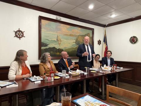 City of Rotterdam Vice Mayor Robert Simons speaks to Nederland city officials and other guests during a Nov. 18 visit by a delegation representing the Netherlands.