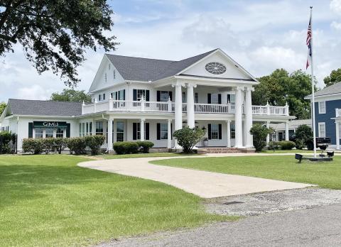 The former Morris-Booz House in Port Arthur is now home to Griffith, Mosley, Johnson and Associates. Photo by Dannie Oliveaux